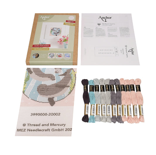 A beginner tapestry kit containing a simple design with easy-to-follow patterns and colourful threads, accompanied by clear instructions, suitable for those new to the craft.