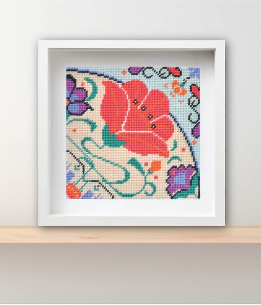 tapestry kit made using brightly coloured wool and framed