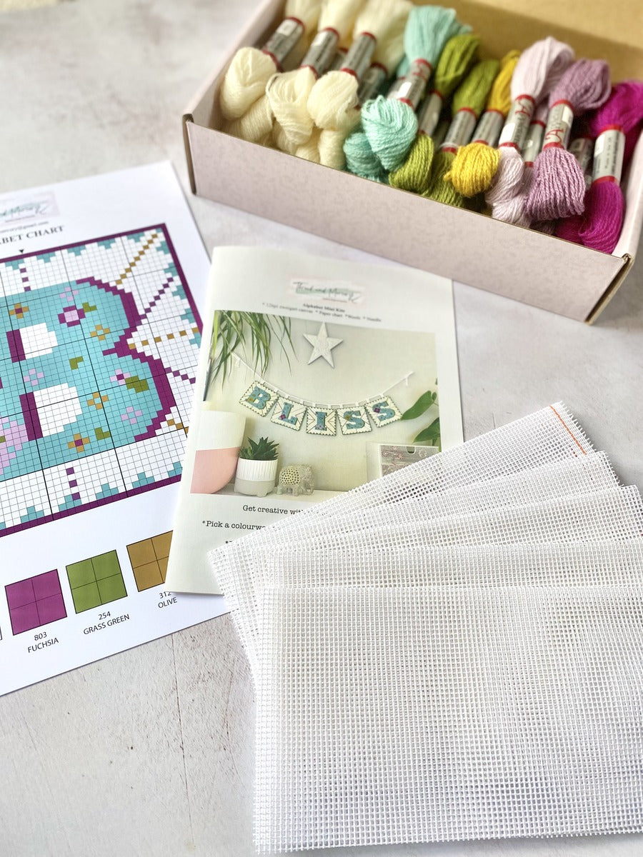 Unleash your creativity with this delightful alphabet tapestry kit featuring five letters of your choice. Dive into a world of stitching and design as you bring each letter to life with vibrant threads and intricate patterns. Whether you spell out names, words, or phrases, this DIY project offers endless possibilities to personalize your space with a touch of handmade charm.