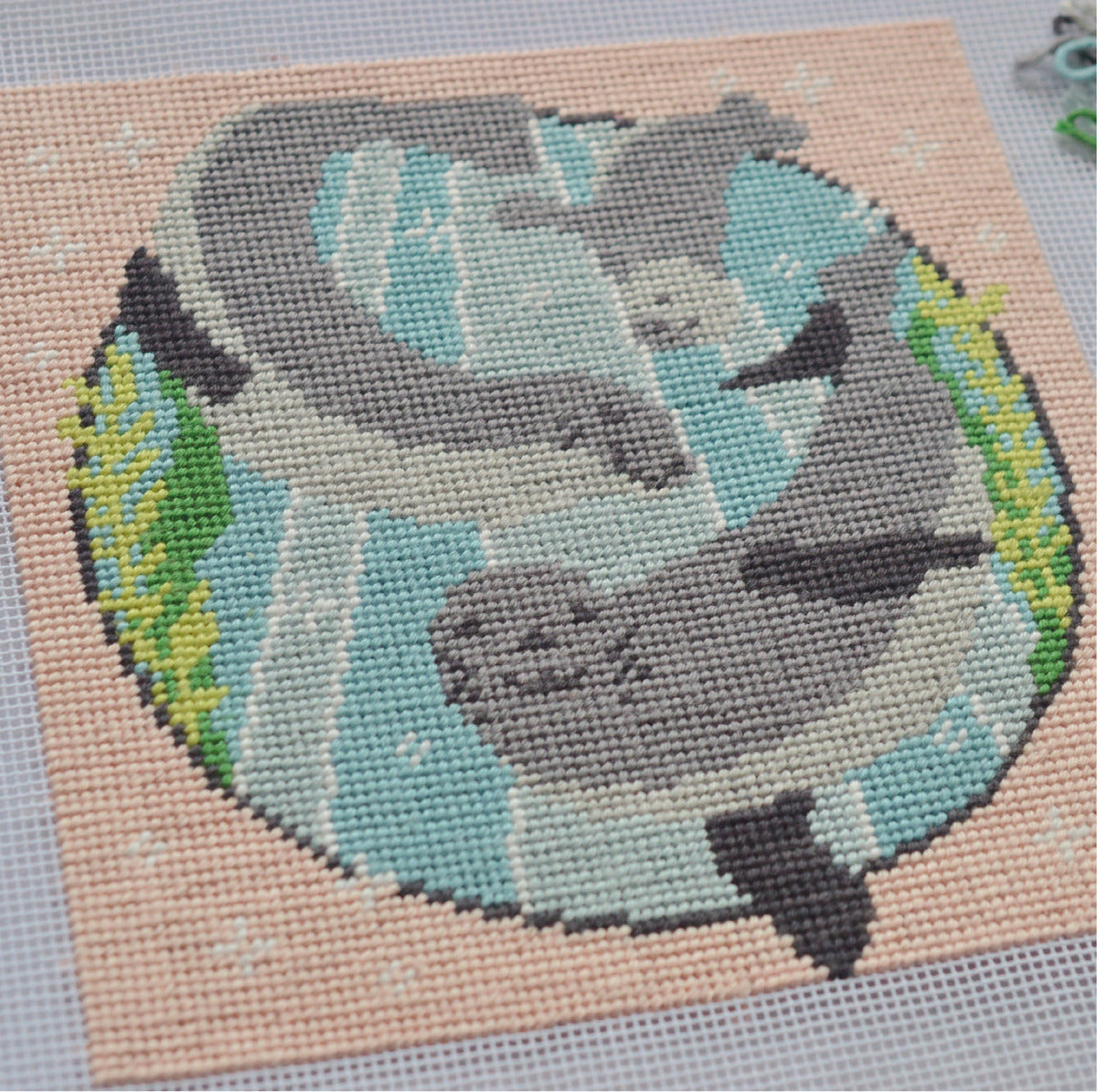 A detailed close up showing the modern tapestry kit worked in tent stitch using soft cotton threads.