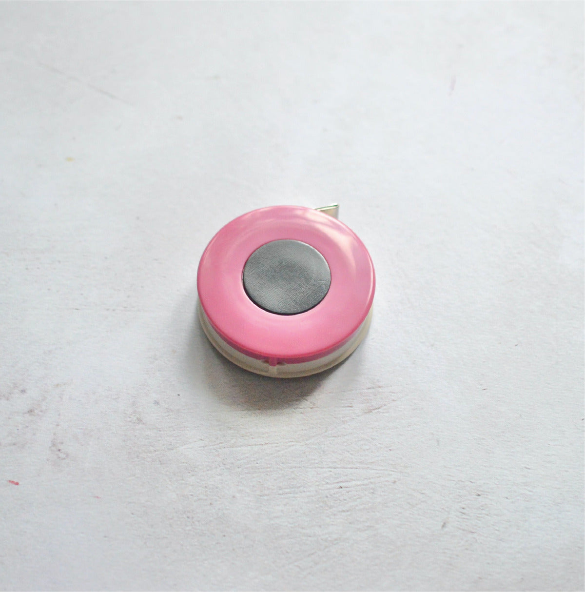 a tape measure with a magnet at the back for handy storage