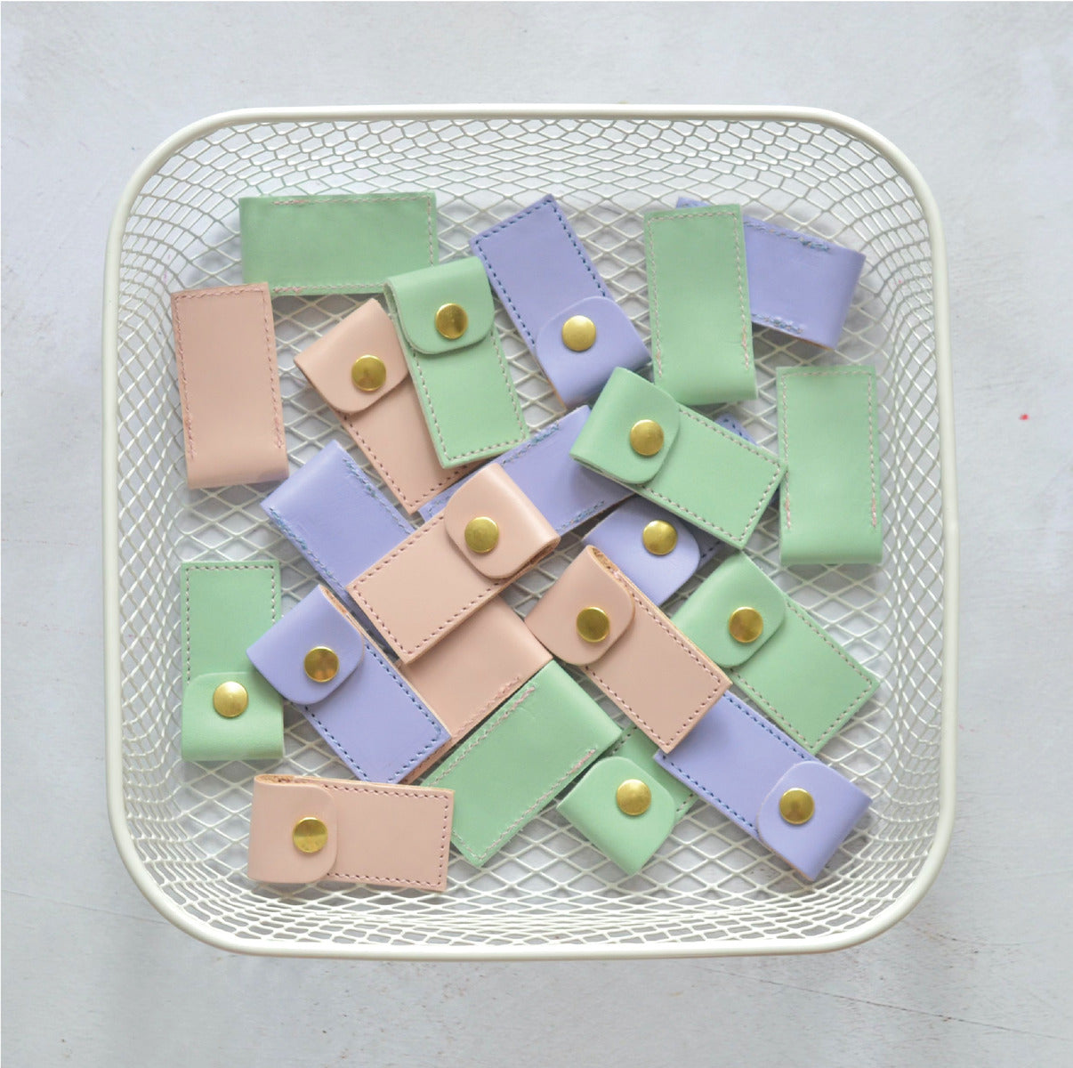 beautifully hand crafted leather cases in pastel colours. Handmade in the UK. Holds tapestry needles