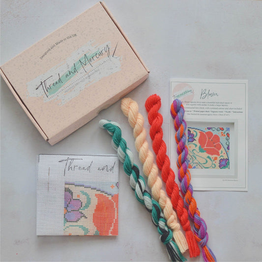 tapestry kit containing printed canvas, tapestry wool and instructions. Presented in a Thread and Mercury box