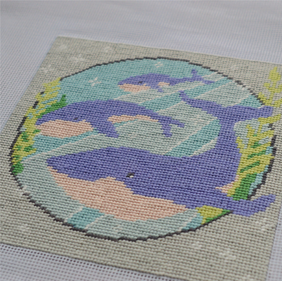 A close up of the modern tapestry kit design showing soft cotton threads using tent stitch.