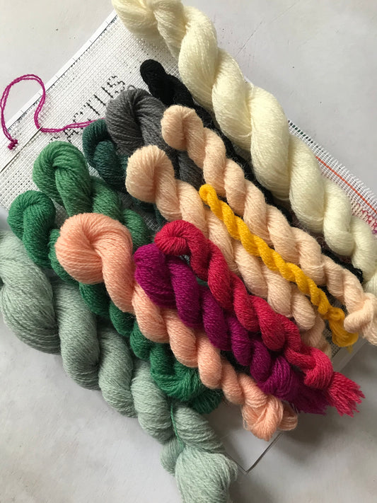 wools included in the kits in colours white, light pink, fuchsia, dark green, light green, yellow, grey