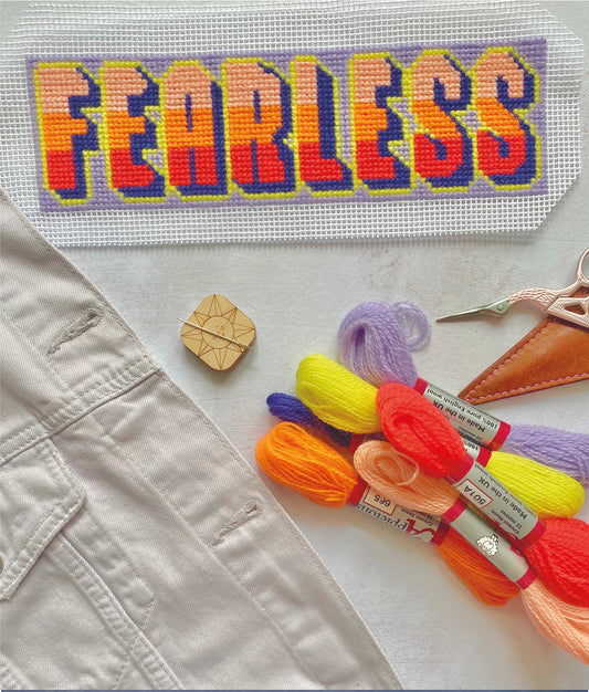 a needlepoint design pdf of the word fearless. Stitched using brightly coloured wool onto canvas