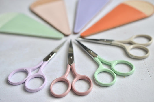 colourful embroidery scissors available in lilac, pink, mint green and stone. With a matching handmade leather case.