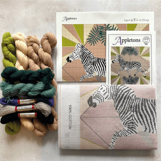 an advanced tapestry kit with wool and printed canvas.