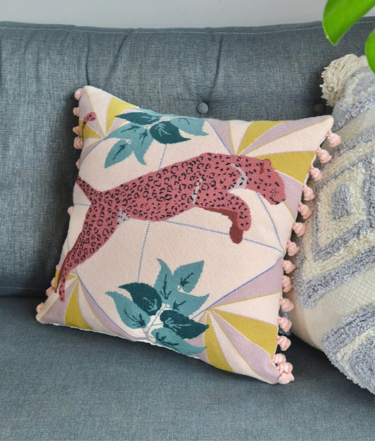 A leopard cushion tapestry kit showcasing a majestic leopard design with intricate patterns and rich colors, providing a captivating project for crafters to create a striking and stylish cushion.