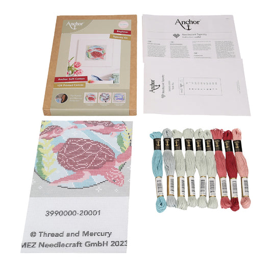 An image showing the contents of the anchor needlepoint kit including a printed canvas and soft cotton thread.