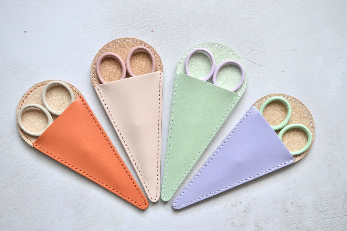 hand made leather case to hold small embroidery scissors. Choose matching or complimentary colours.